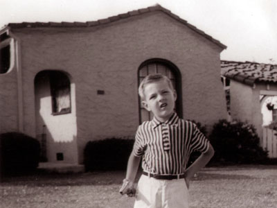 That's me around age five (I'm guessing) in front of the house I just sold.